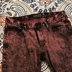 Pink/black wash skinny jeans.